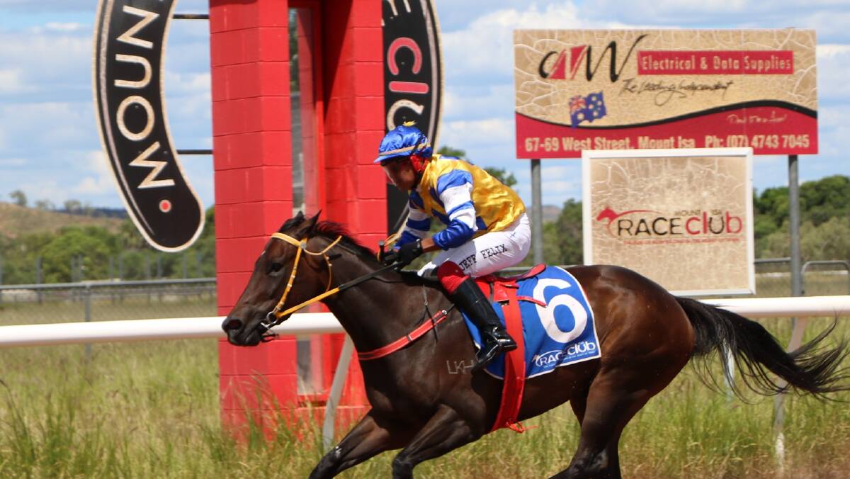 WINNER: Jeffrey Felix rides Words Unspoken to victory in Race 2 at the Beach Day races Mount Isa. Photo: contributed.