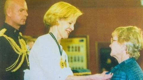 Ada Miller receiving her Order of Australia Medal from the Governor General, Quentin Bryce ca 2005.