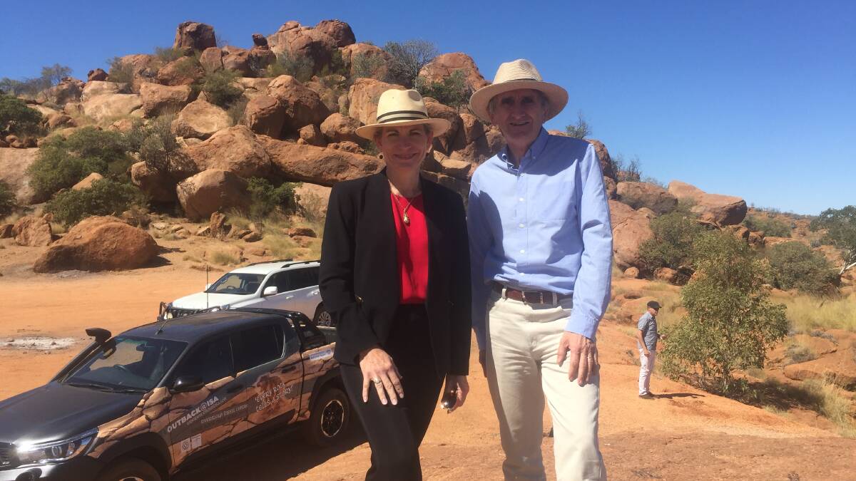 LOCAL GEM: Tourism boss Daniel Gschwind takes a tour of the Granites with Mount Isa Mayor Joyce McCulloch. Photo: Derek Barry