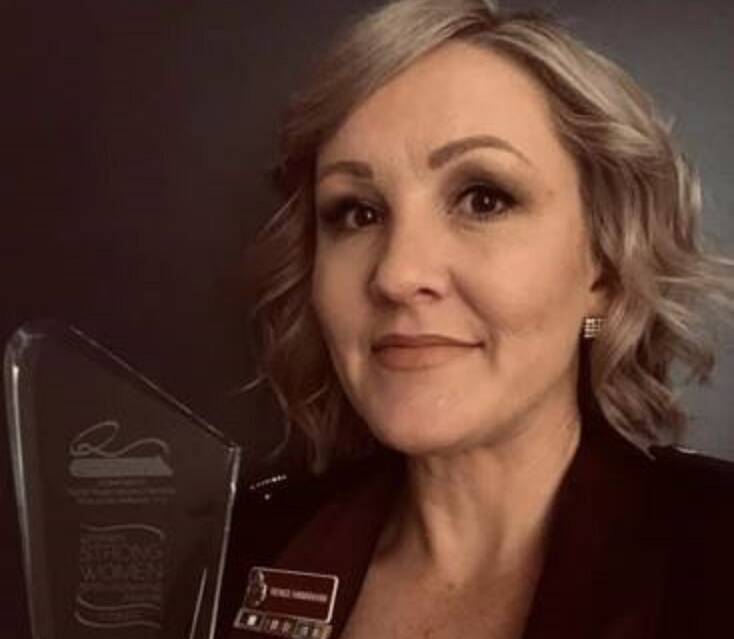 Snr Sgt Renee Hanrahan proudly holds her 2019 Influential Leader of The Year she won at the QRRRWN Strong Women Leadership Awards last week.