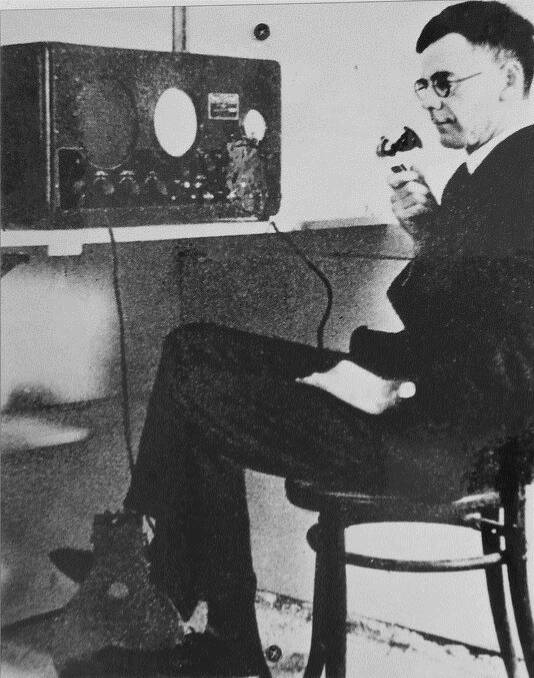 Alfred Traeger with the pedal radio he invented.