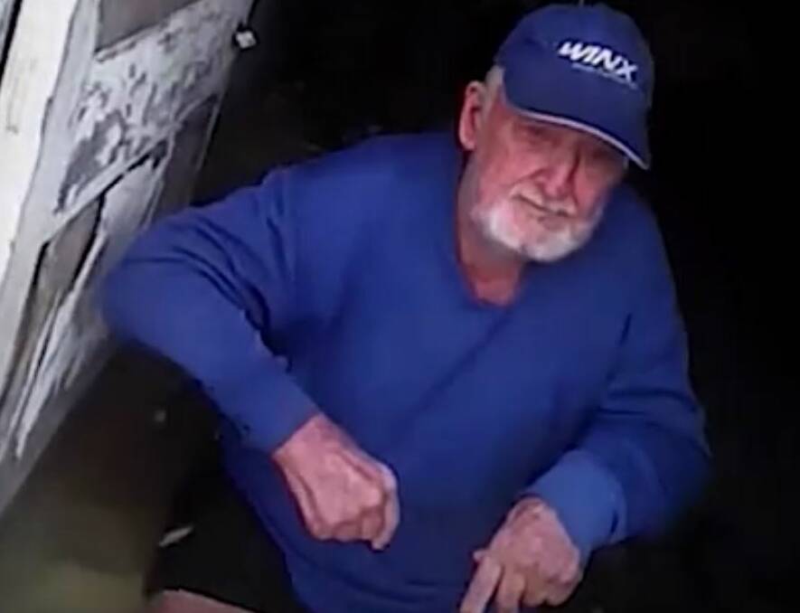 Des Smith, in a stills image from the Police video of his rescue from the floods.