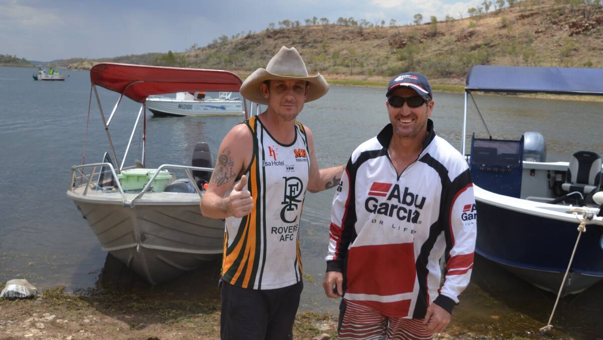 GOOD CATCH: Nathan Mann and Rick Baillie give a thumbs up to the 2017 Fishing Classic at Lake Moondarra.