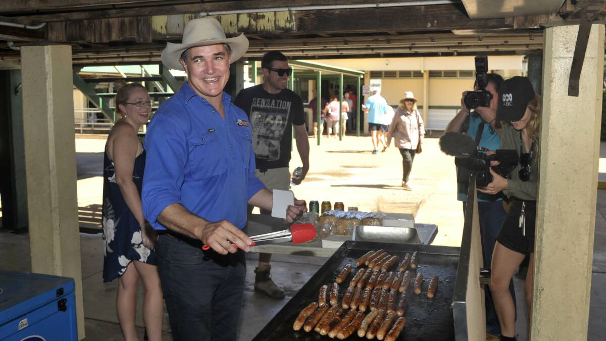 Robbie Katter dishes out the sausages on election day. Photo: contributed