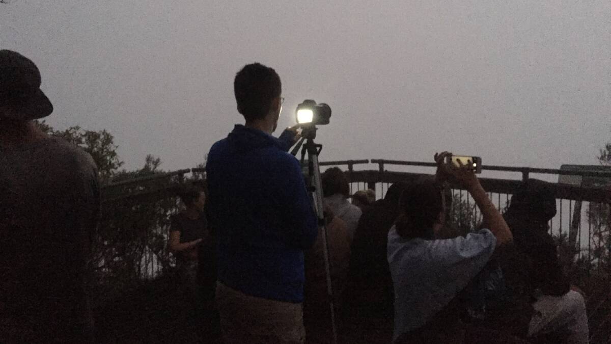 Photographers at the ready on the summit of Mt Warning were disappointed that the cloud cover ruined their dawn photos. 