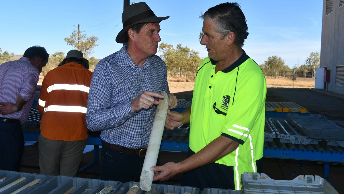 Mines Minister Dr Anthony Lynham and Peter Brown check out samples at the John Campbell Miles core drill facility.