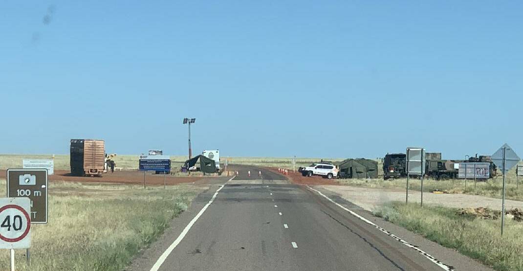 Police and army patrol the border on the Barkly Hwy at Camooweal earlier in the pandemic.