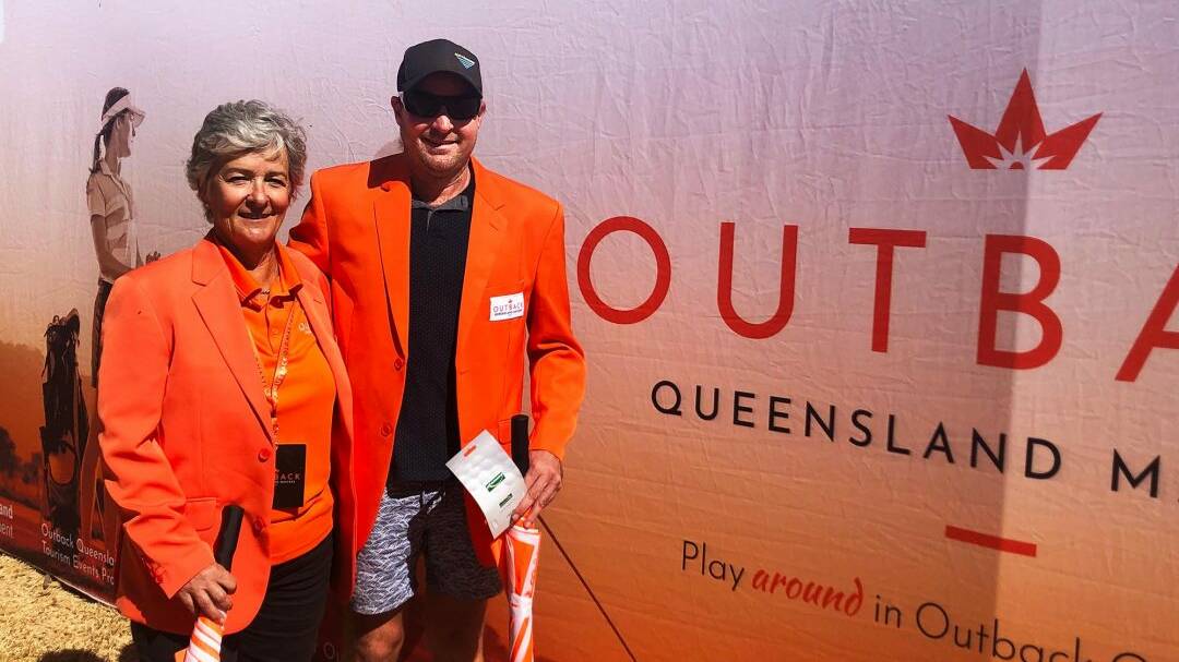TOP NOTCH: Mount Isa Outback Golf Masters winners Kerrie Rule and Conrad McElligott wear their orange blazers. Photo: supplied
