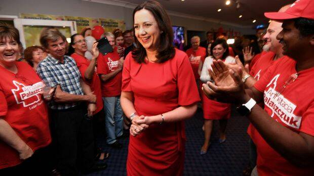Annastacia Palaszczuk is congratulated by supporters as she edges towards retaining government in Queensland. 
