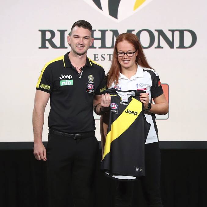 DREAM COME TRUE: Sophie Molan holds her new Richmond jumper after being drafted seventh overall in the AFLW darft. Picture: Richmond Football Club.