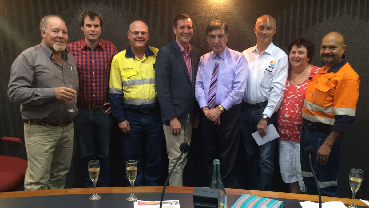 HAPPY: Officials celebrate after it was announced the NT gas pipeline was coming to Mount Isa. 