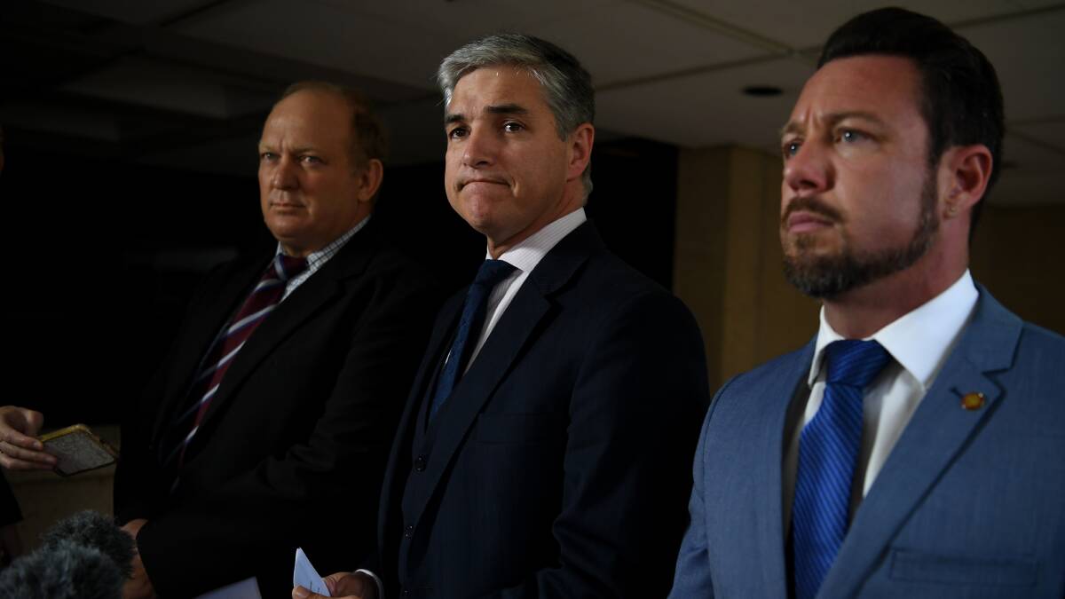  Queensland MPs Shane Knuth, Robbie Katter and Nick Dametto are seen during a press conference at Parliament House in Brisbane. Photo: AAP