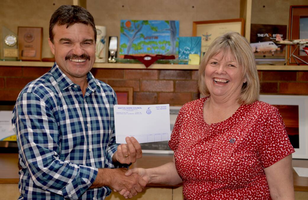 Winton Mayor Gavin Baskett with Amanda Searle who won $1000 in the pay your rates early competition.