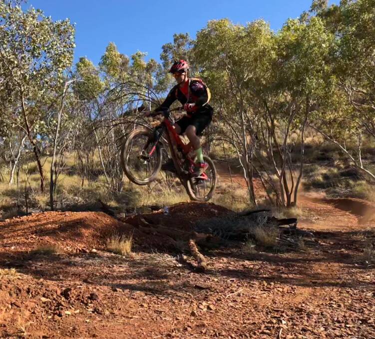 Flying high: Jonathan Postle is a member of the Stack City Mountain Bike Club. Photo: supplied. 
