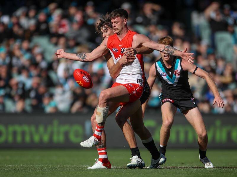 Ill-discipline from Sydney ruckman Peter Ladhams proved costly for the Swans against Port Adelaide.