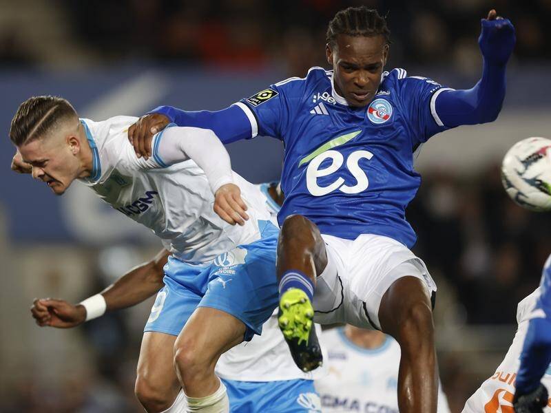 Strasbourg's Emanuel Emegha (r) was on target in a 1-1 draw with Brest in the French league. (AP PHOTO)