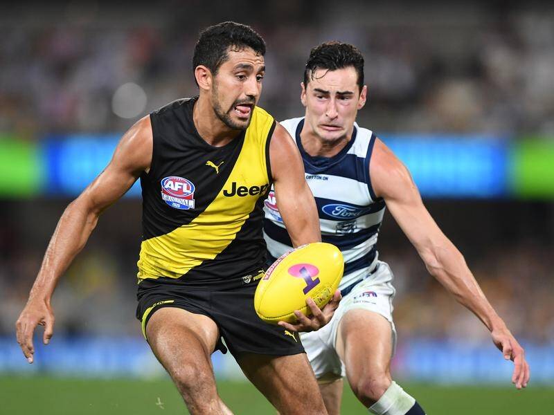 Marlion Pickett is one of three Richmond players to sign new two-year deals with the AFL premiers.