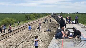 Seven cars derailed after the Amtrak train hit a truck in rural Missouri.