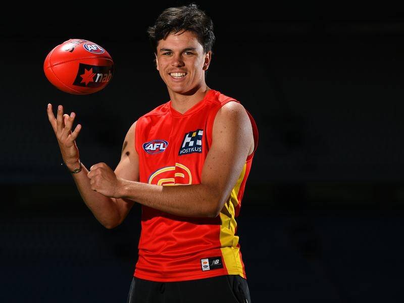 Elijah Hollands is excited to be part of a Gold Coast squad brimming with young talent.