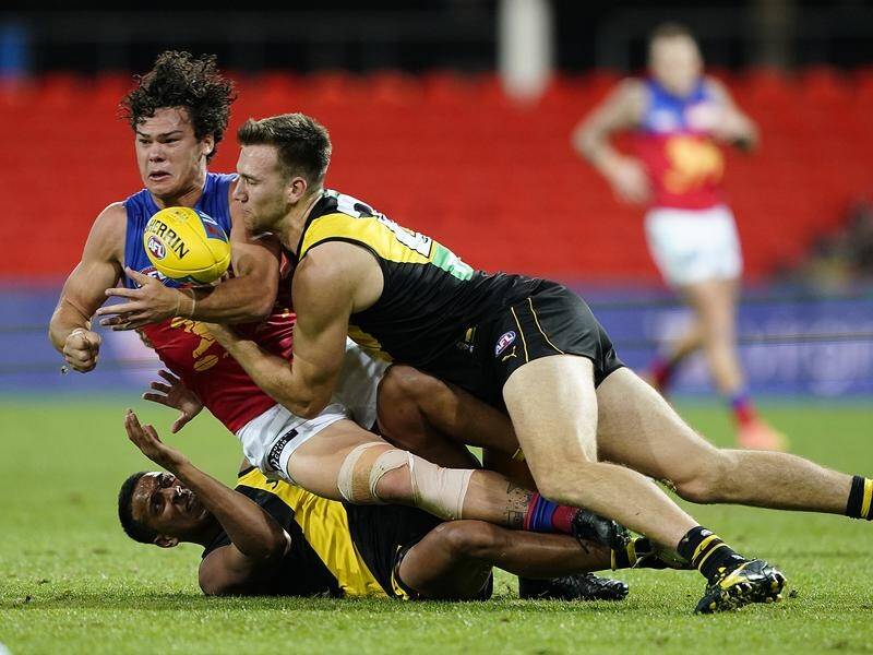 Defending premiers Richmond have climbed to third on the AFL ladder after beating Brisbane.