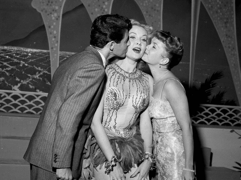 Actress Rhonda Fleming (centre with Eddie Fisher and Debbie Reynolds) has died peacefully at 97.