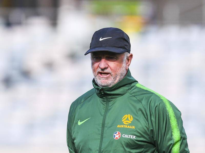 Coach Graham Arnold says Socceroos stars should be "holding their hands up" for an Olympic place.
