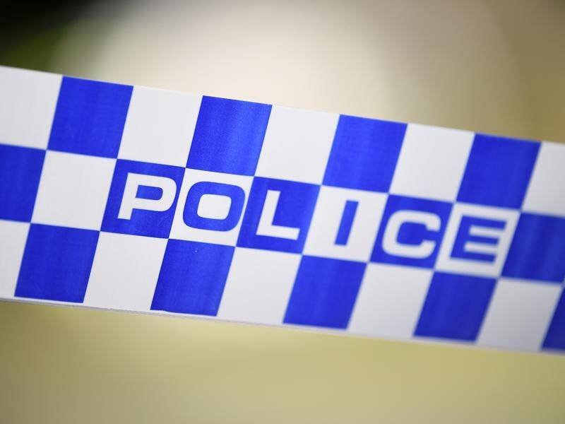 Police are holding three people in custody after four people were shot on a Queensland property. (James Ross/AAP PHOTOS)