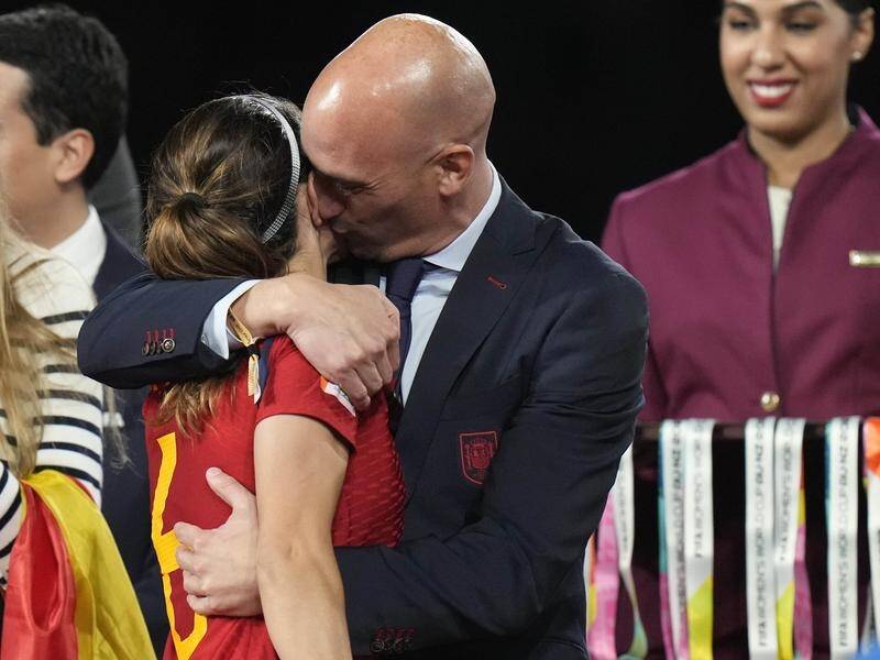 Spanish FA chief Luis Rubiales (hugging Aitana Bonmati) has apologised for kissing Jenni Hermoso. (AP PHOTO)