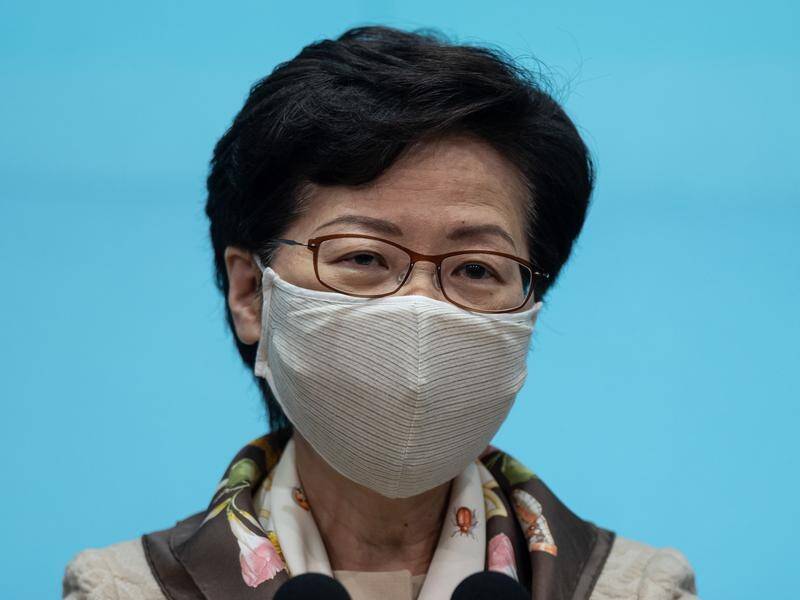 Hong Kong leader Carrie Lam accuses foreign governments of double standards over Beijing's plans.