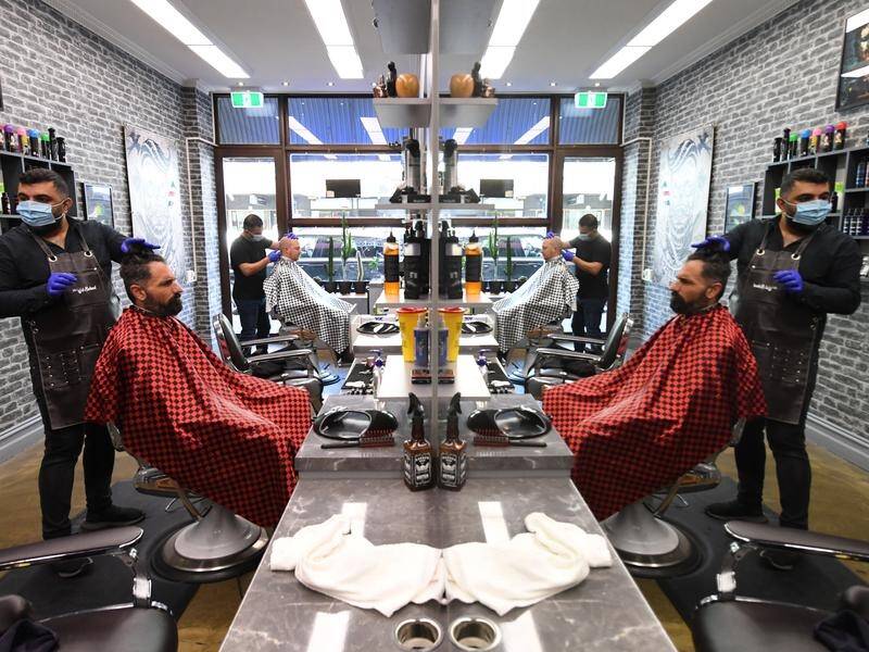 Hairdressers are open again in Melbourne after Victoria's easing of coronavirus restrictions.