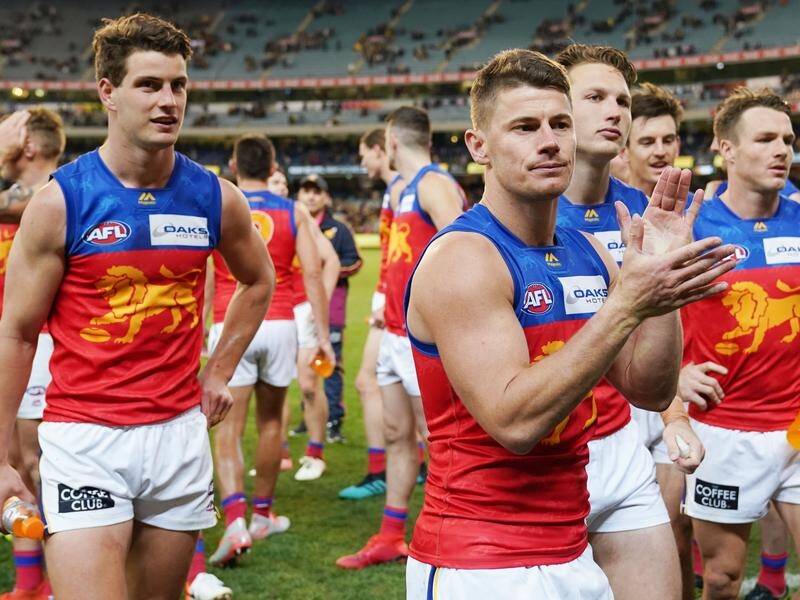 Lions skipper Dayne Zorko leads his team off after the Tigers loss and says they will learn from it.