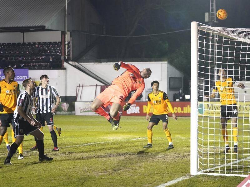Wolves' John Ruddy pushes Andy Hall's effort over the bar as they beat Chorley 1-0 in the FA Cup.