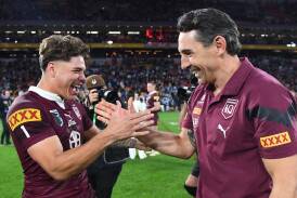 Queensland No.1 Reece Walsh (L) and coach Billy Slater (R) after 2023 State of Origin series win. (Jono Searle/AAP PHOTOS)