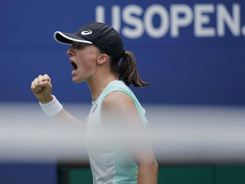 World No.1 Iga Swiatek celebrates after defeating Jule Niemeier to reach the US Open quarter-finals. (AP PHOTO)