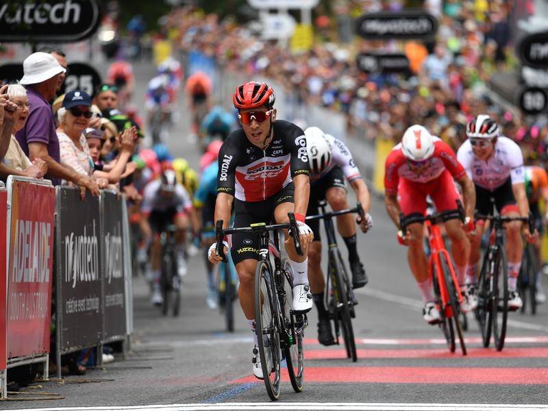 Simon Yates crashed late on stage two of the Tour Down Under won by Lotto-Soudal's Caleb Ewan.