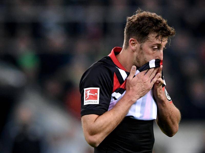 Frankfurt skipper David Abraham faces sanctions for striking Freiburg's coach after his send-off.