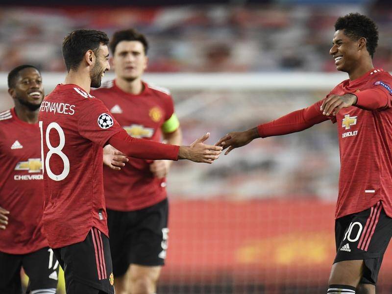 Marcus Rashford is congratulated after scoring a hat-trick for Manchester United against Leipzig.