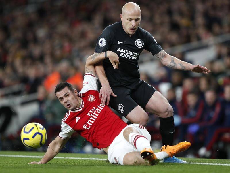 Granit Xhaka (l), seen challenging Brighton's Aaron Mooy, has been given an Arsenal lifeline.