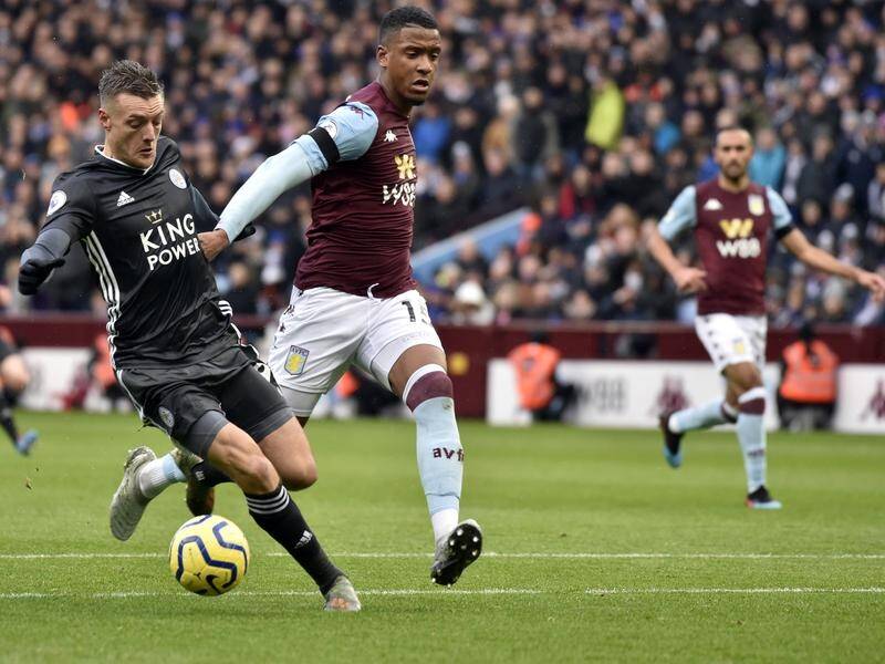 Leicester's Jamie Vardy (left) scored twice in the 4-1 EPL victory at Aston Villa.