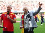 Former Gold Coast captain Gary Ablett (right) has been made a life member of the AFL club. (Jason O'BRIEN/AAP PHOTOS)