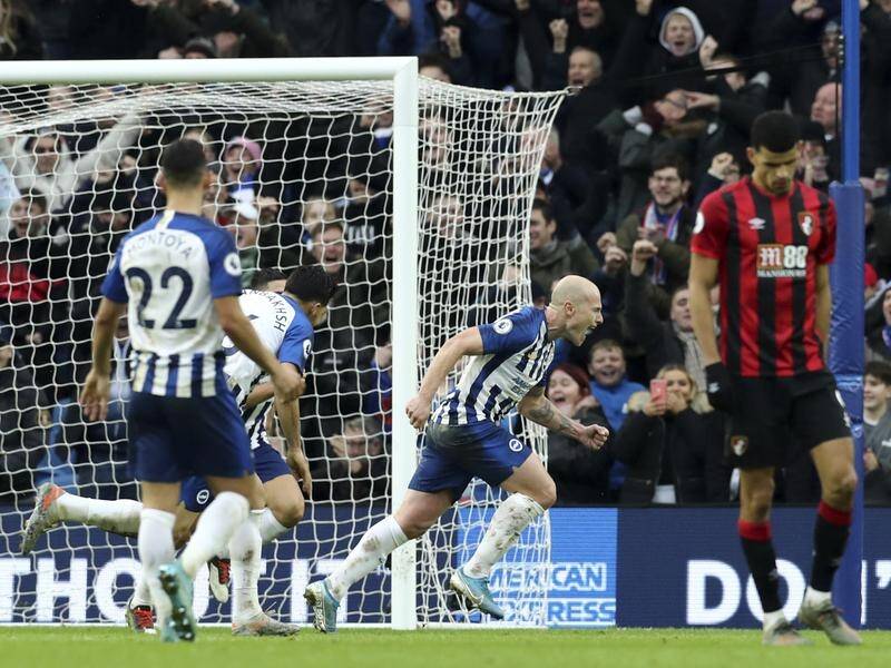 Aaron Mooy (C) has scored twice this season for Brighton which has helped earn him a permanent deal.