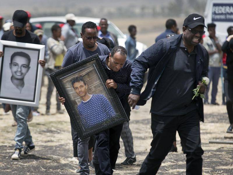 Families of the victims of the Ethiopian Airlines disaster have been mourning at the crash scene.