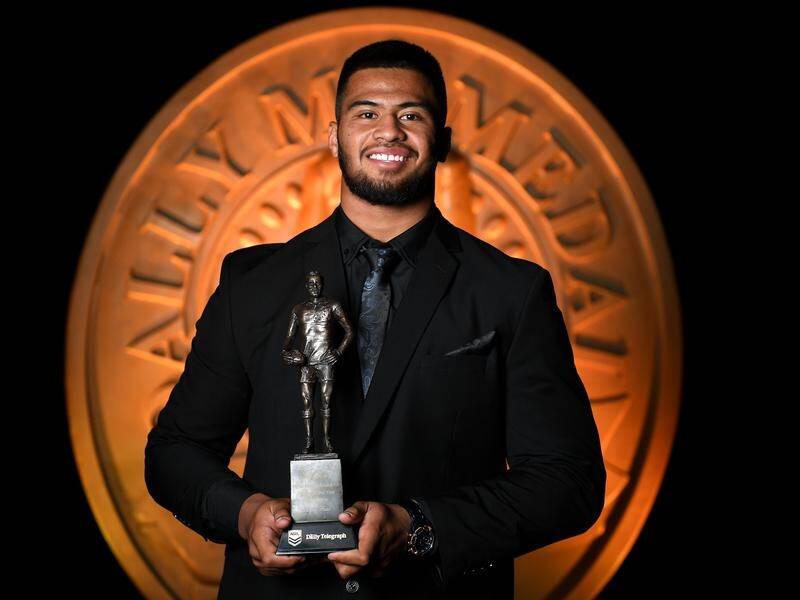 Brisbane's Payne Haas with the Dally M Rookie of the Year award, honouring his superb 2019.