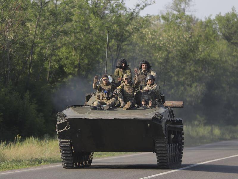 Ukrainian troops are holding out against sustained Russian assaults in the eastern Donetsk region.