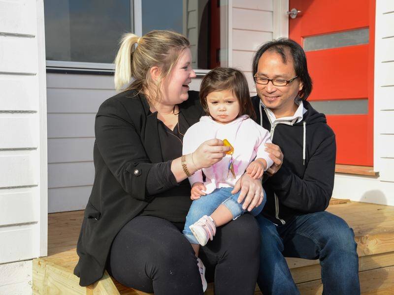 A young family has benefited from funds raised by Homes for Homes, an affordable housing project.