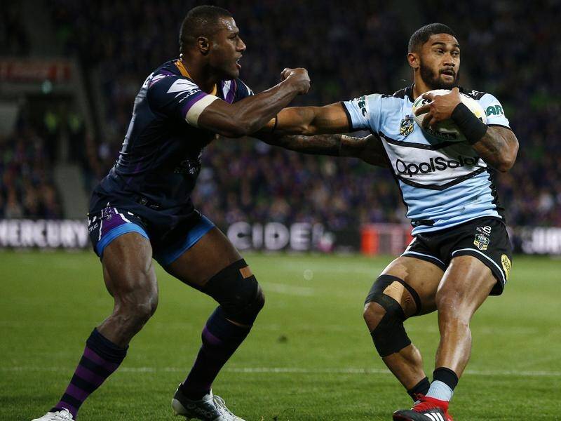 The Melbourne Storm have signed former Sharks player Ricky Leutele (r) for the season.