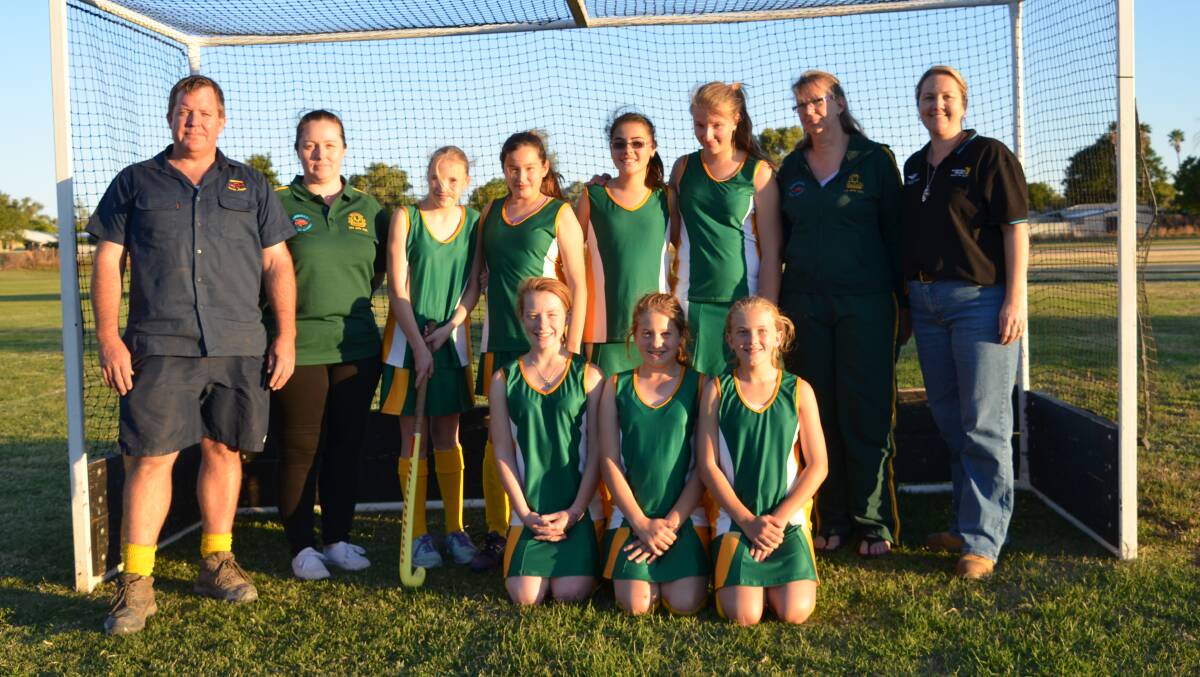 UNDER-13 MOUNT ISA GIRLS: Nathan Brogden (Hankinson Smash Repairs), Hope Philip (coach), Shayne O’Shea-Breed, Shoshone Lupton, Sophie Milligan, Alyssa Liddle, Fiona Liddle (manager), Janet Green (Protector Alsafe), at back, with Jade Smith, Chanise MacFarlane, and Zanté Sloane.