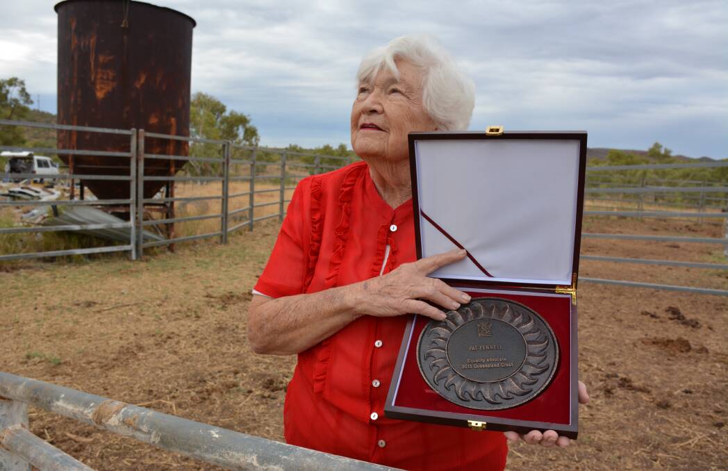 GREAT HOPES FOR THE FUTURE: Pat Fennell carries her Queensland Great Award she received on Saturday night. 