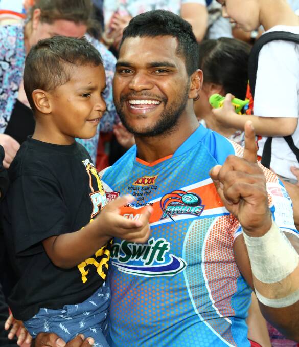 Davin Crampton, with son Tane, 4, has signed with the Gold Coast Titans on a one-year deal.