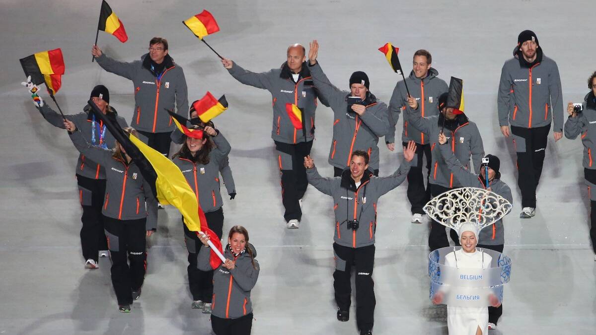 Bobsledder Hanna Emilie Marien of the Belgium Olympic team carries her country's flag during the Opening Ceremony of the Sochi 2014 Winter Olympics. Picture: Getty